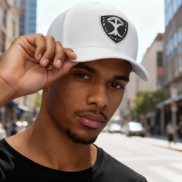 Texas Insignia – Metro Collection logo over a vibrant cityscape at night, featuring modern skyscrapers, bright lights, and urban energy reflecting Texas pride.