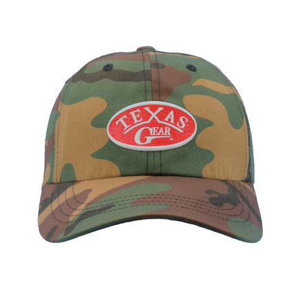 Texas Gear Emblem. Adorn the FlexFit YP Classic Retro “CAMO” Trucker Hat