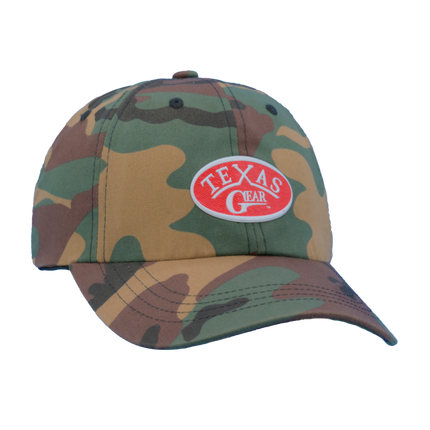 Texas Gear Emblem. Adorn the FlexFit YP Classic Retro “CAMO” Trucker Hat