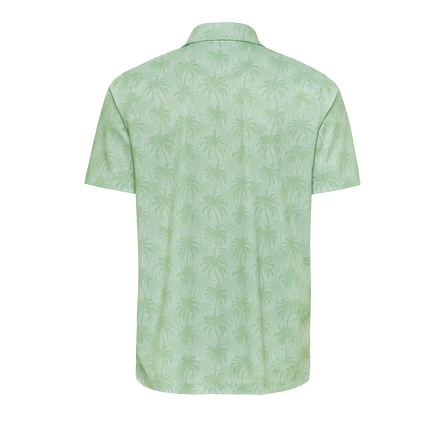 Texas-Inspired Charleston Green Palm Performance Polo Shirt, adorned with the 3D TX-GOLF TG Logo.
