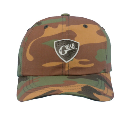 Texas Gear Insignia Logo. Adorn the FlexFit YP Classic Retro “CAMO” Trucker Hat