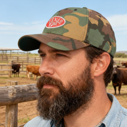 Texas Gear Emblem. Adorn the FlexFit YP Classic Retro “CAMO” Trucker Hat