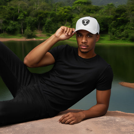 Tex-Insinia Logo. adorn on to 100P Flexfit hat